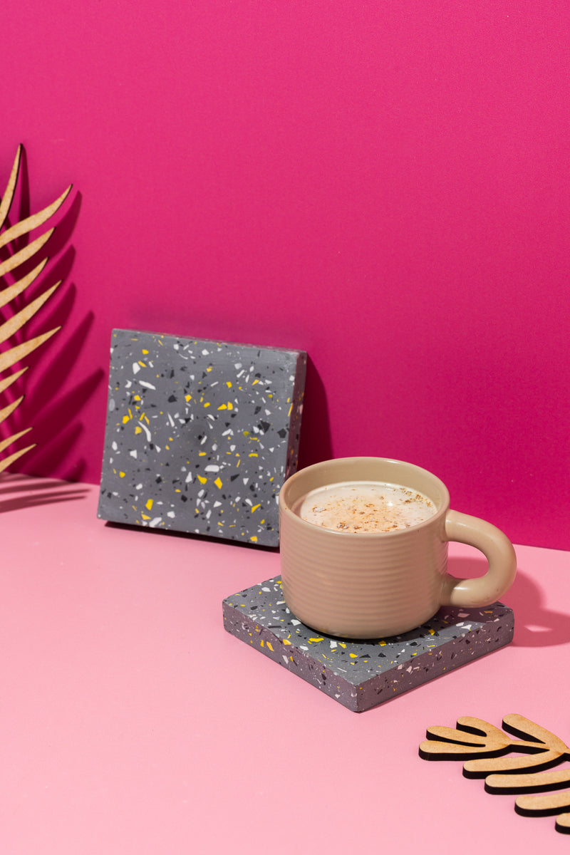 White, Yellow, Black and Grey Coasters